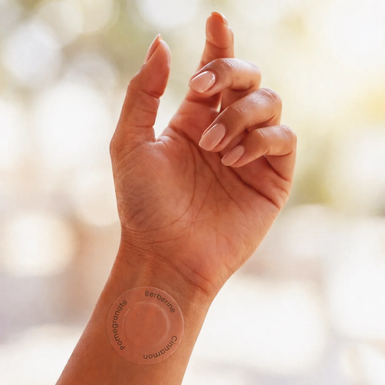 A LifeGauge patch worn on the wrist